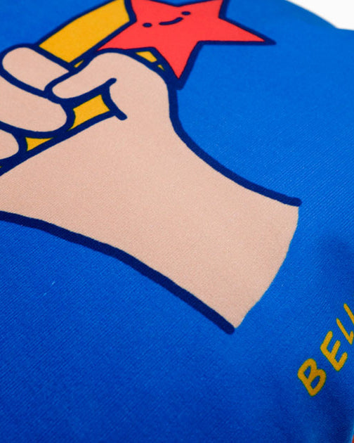 Dream chaser 'believe' cushion cover with shooting star illustration.