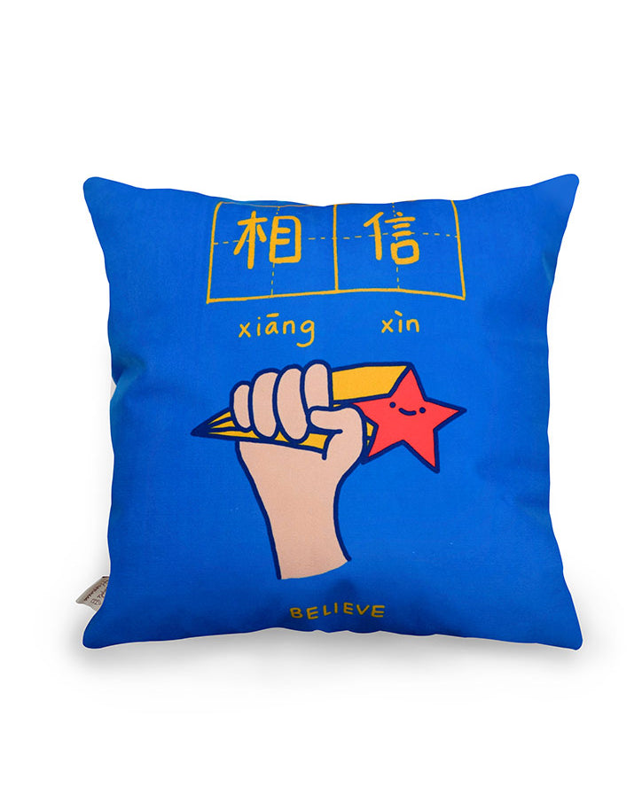Dream chaser 'believe' cushion cover with shooting star illustration.