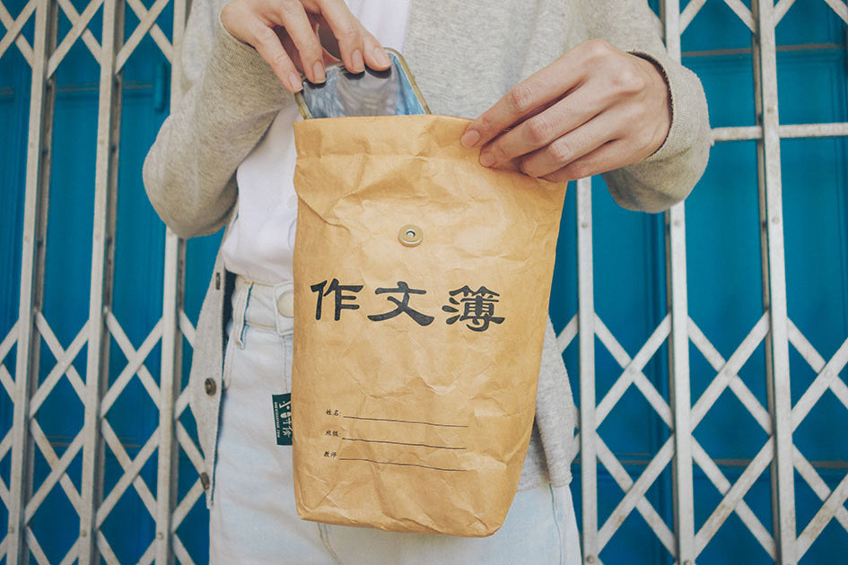 Eccentric and quirky old school sling bag with designs inspired by chinese composition and old takeaway paper bags