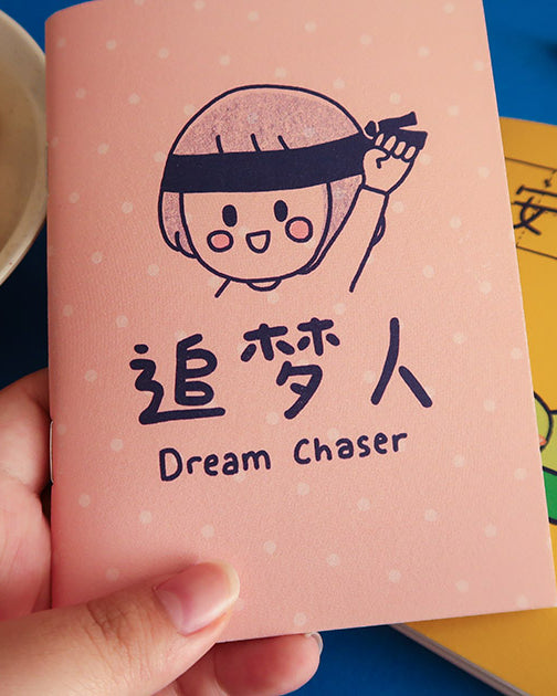 Dream chaser A6 notebook with cute illustrated girl for journaling or note taking.