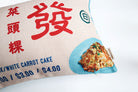 Up-close old school carrot cake store signage cushion cover.