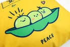 Dream chaser 'peace' cushion cover with adorable three peas in a pod illustration.