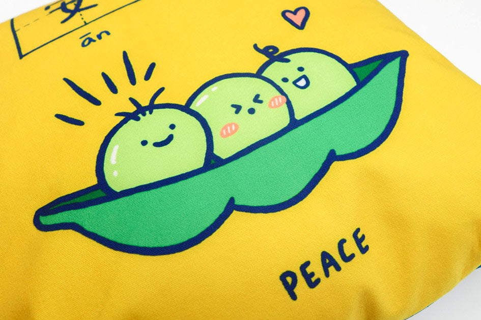 Dream chaser 'peace' cushion cover with adorable three peas in a pod illustration.