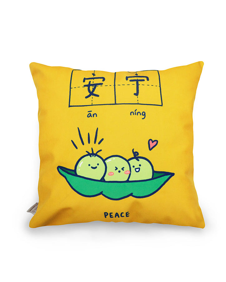 Dream chaser 'peace' cushion cover with adorable three peas in a pod illustration.