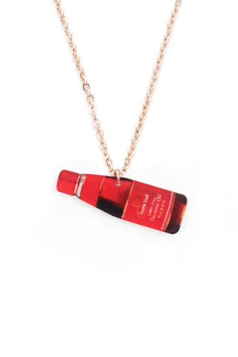 Cute and quirky sesame oil necklace inspired by Mama Shop products