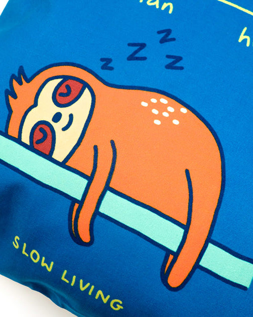 Dream chaser 'slow living' cushion cover with sloth illustration.