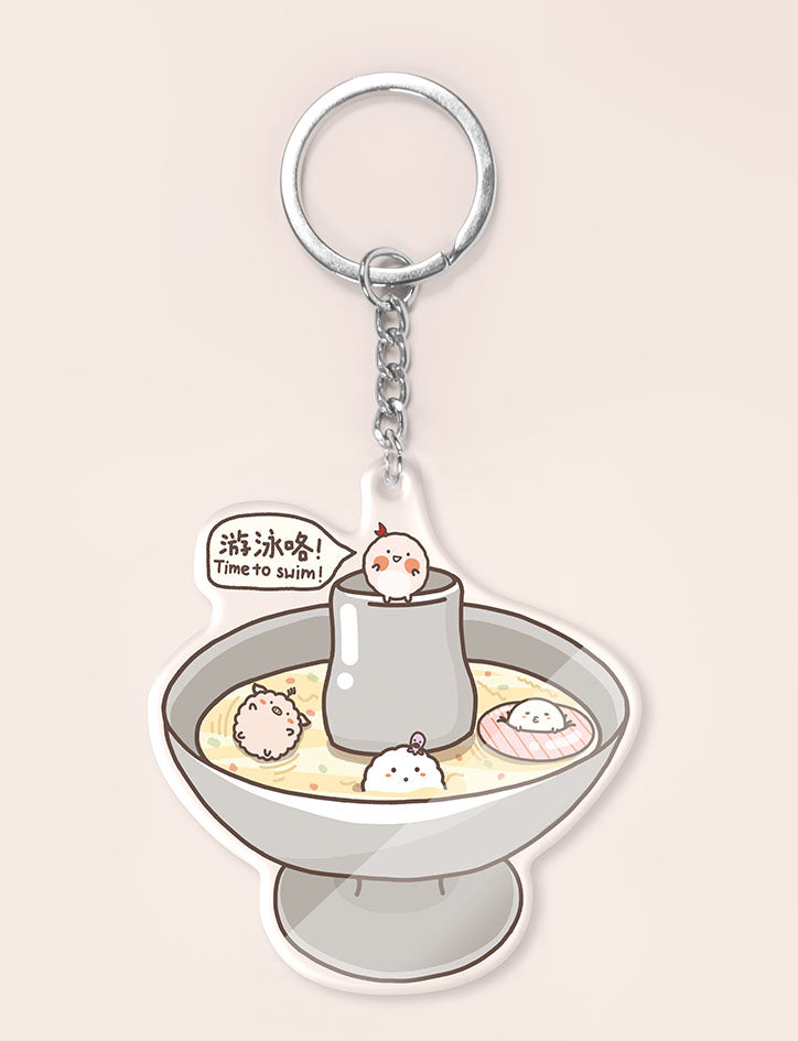 Cute Sumoboru characters in a steamboat keychain
