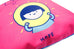 Up-close of dream chaser 'hope' cushion cover in pink with cute girl illustration.