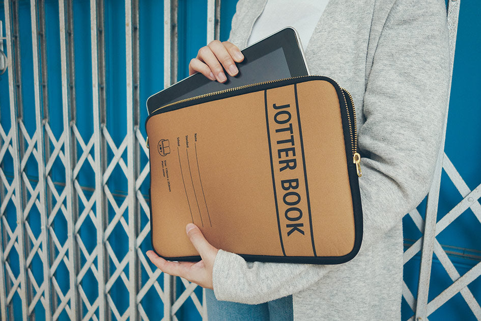 Quirky and nostalgic laptop sleeve inspired by Jotter Book