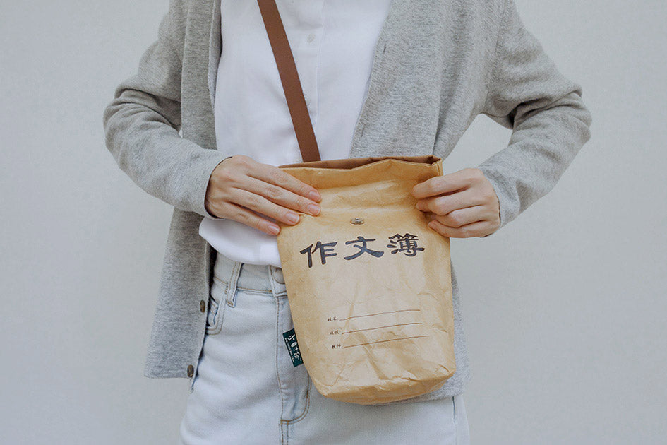 Eccentric and quirky old school sling bag with designs inspired by chinese composition and old takeaway paper bags