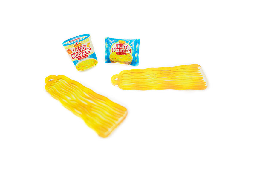 Cute nissip cup noodle inspired acrylic earrings with dangling noodles.