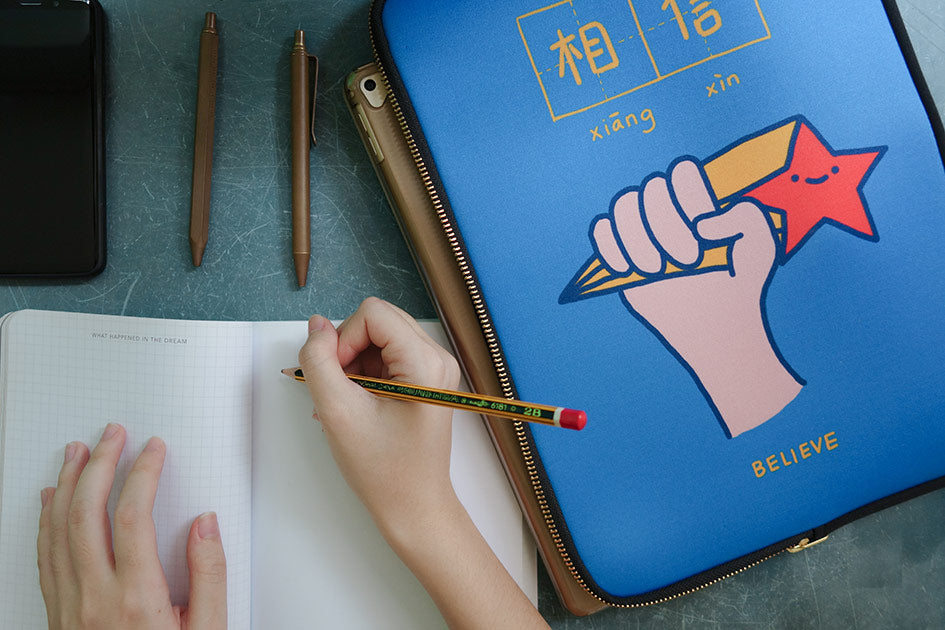 Blue inspirational laptop bag with words of encouragement - believe