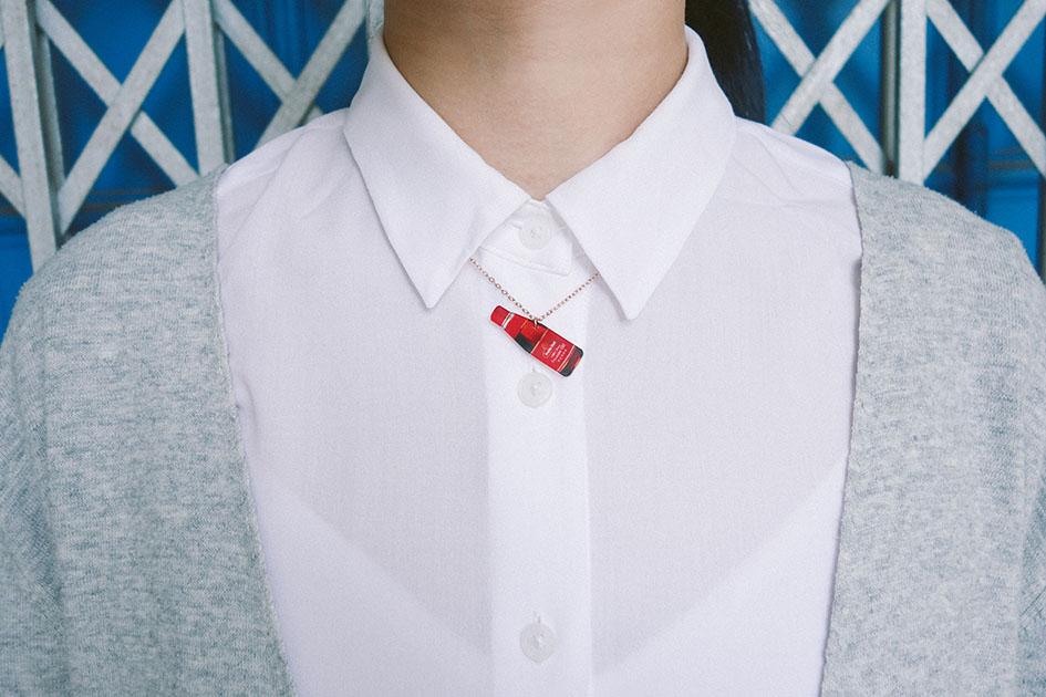 Quirky sesame oil bottle necklace for your OOTD!