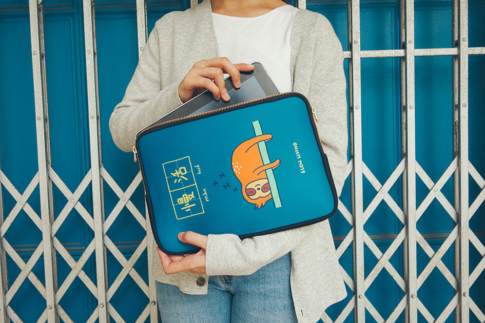Encouraging laptop sleeve with cute design of a sleeping sloth