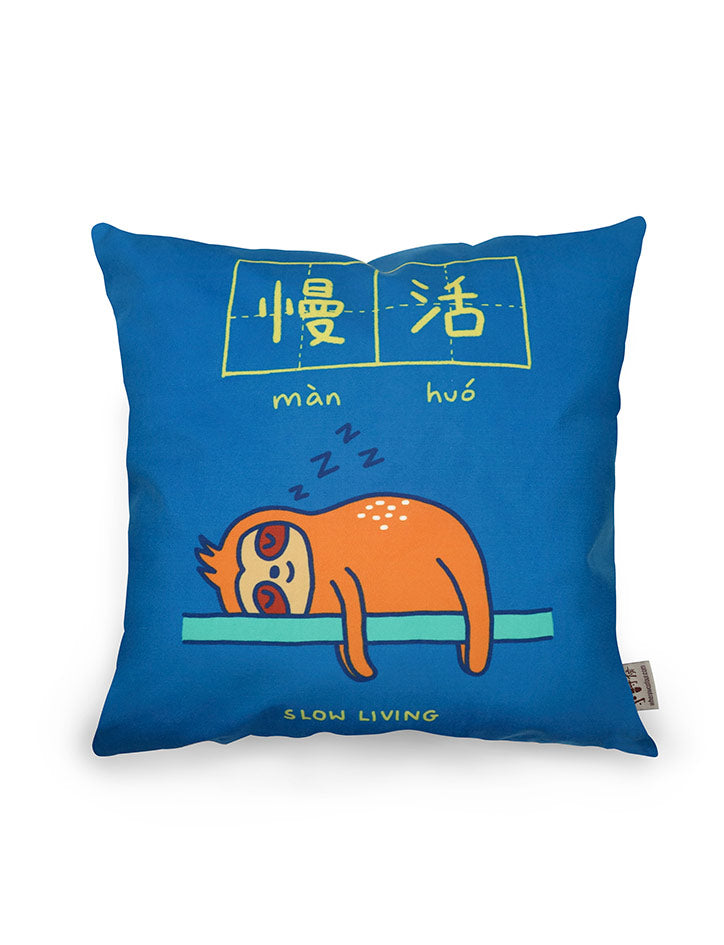 Dream chaser 'slow living' cushion cover with sloth illustration.