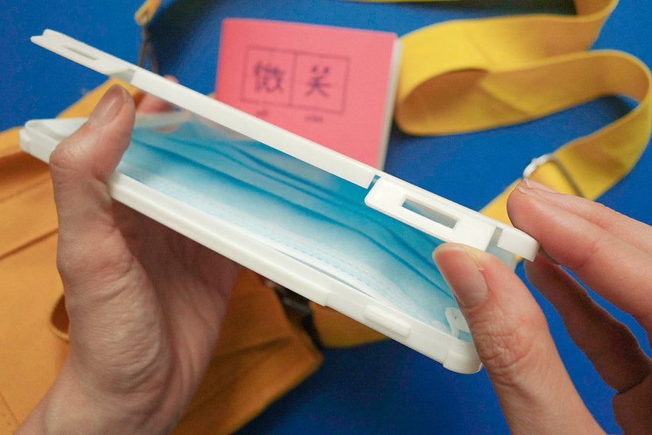 Old-school good citizen textbook inspired portable mask case.